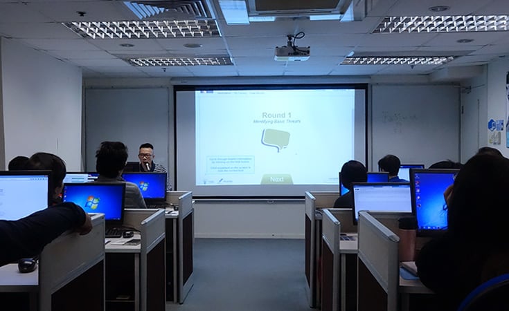 The instructor demonstrating how the cybersecurity product works